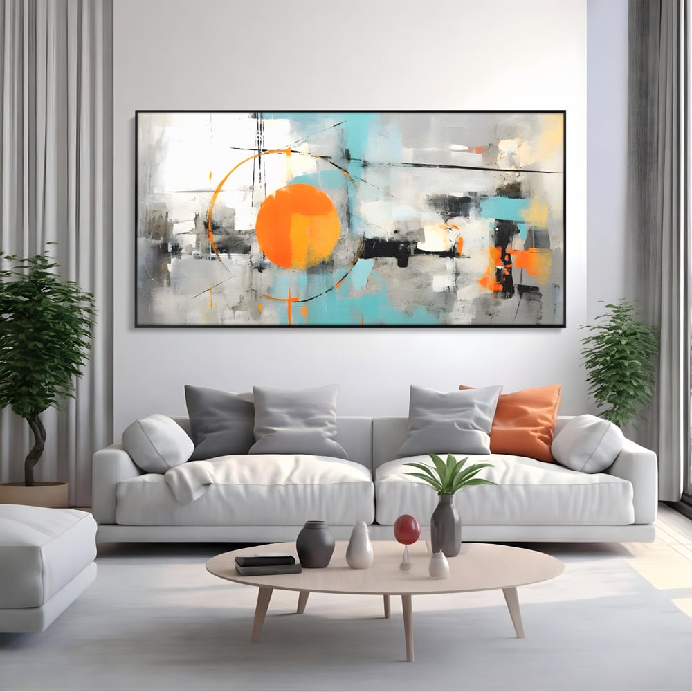 Tablou canvas cu pictura abstracta cu cerc portocaliu, in rama de aluminiu negru, pe perete intr-un living